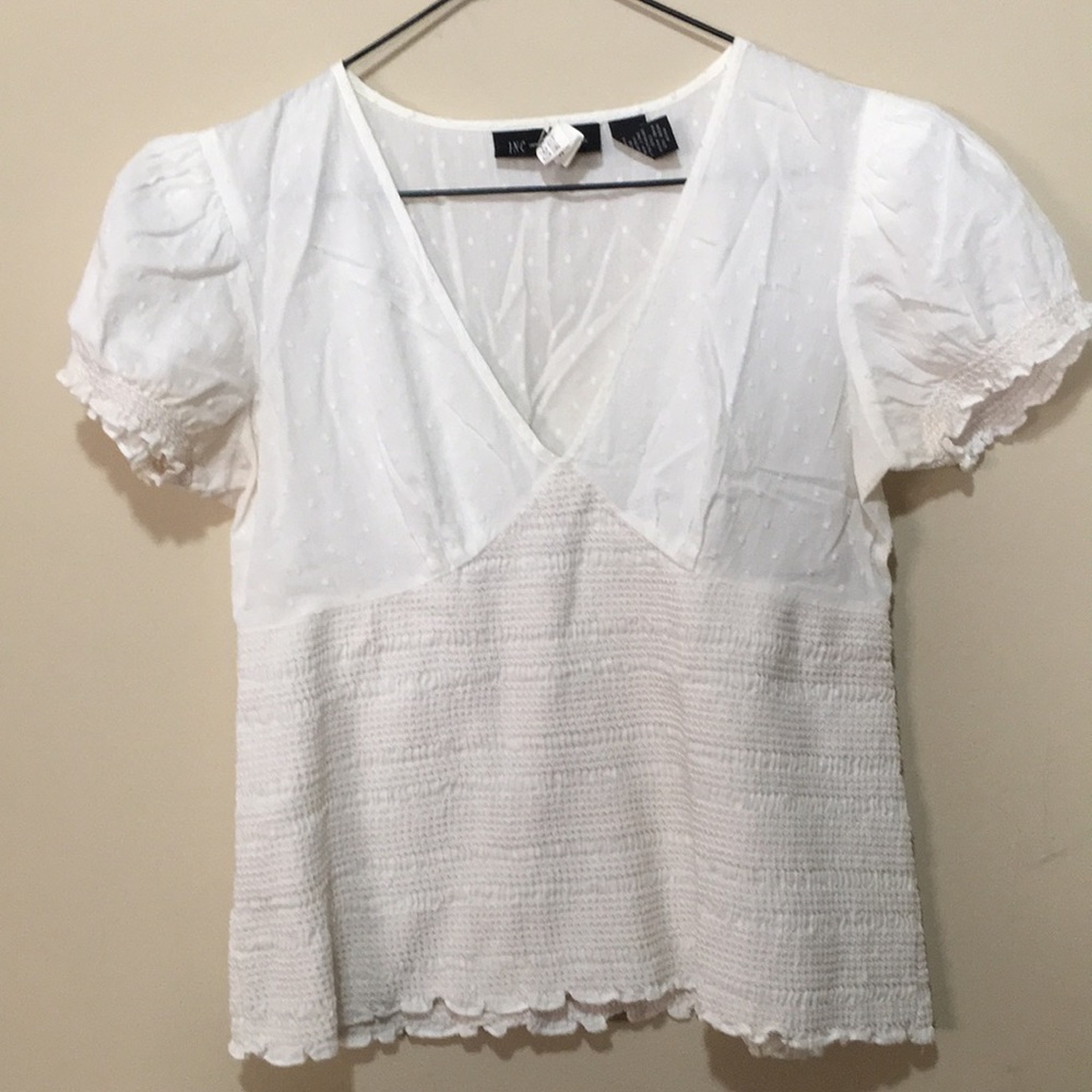 Off white delicate top.